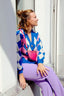 cilou-leren-heuptas-met-rits-fuchsia-sweet-like-you-model-vooraanzicht-1
