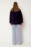 satijnen-gewatteerd-jasje-sweet-like-you-navyblauw-model-achteraanzicht-1
