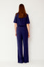 carello-jumpsuit-blauw-met-korte-mouwen-mbym-model-achteraanzicht-1