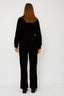 zwarte-fluwelen-jumpsuit-met-studs-met-riem-en-v-hals-yas-model-achteraanzicht-1