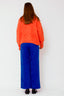 lauren-cardigan-gebreid-oranje-knoopsluiting-ribversieringen-sweet-like-you-model-achteraanzicht-1