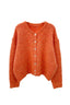 lauren-cardigan-gebreid-oranje-knoopsluiting-ribversieringen-sweet-like-you-productfoto-vooraanzicht-1