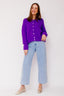 lauren-cardigan-gebreid-paars-knoopsluiting-ribversieringen-sweet-like-you-model-vooraanzicht-4