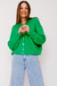 lauren-cardigan-gebreid-groen-knoopsluiting-ribversieringen-sweet-like-you-model-vooraanzicht-1
