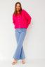 lauren-cardigan-gebreid-fuchsia-knoopsluiting-ribversieringen-sweet-like-you-model-vooraanzicht-5