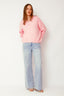 lauren-cardigan-gebreid-roze-knoopsluiting-ribversieringen-sweet-like-you-model-vooraanzicht-3
