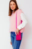 grace-schoudertas-met-drukknoop-suede-leer-fuchsia-sweet-like-you-model-vooraanzicht-2