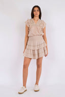 kenia-minirok-franjes-neo-noir-beige-model-vooraanzicht-1