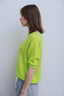 charline-sweater-korte-mouwen-fluo-geel-sweet-like-you-model-zijaanzicht-1