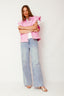 flounce-mouwloos-denim-jasje-roze-sweet-like-you-model-vooraanzicht-3
