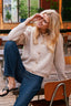 limo-fluffy-gebreide-cardigan-neo-noir-beige-model-vooraanzicht-1