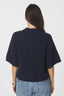 benuta-fluffy-gebreide-cardigan-navy-melange-neo-noir-modelfoto-achteraanzicht-1