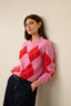 harlekin-argyle-trui-fuchsia-culture-lookfoto-vooraanzicht-4